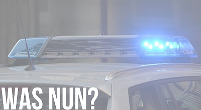 Formulierung Was nun vor einem Streifenwagen mit Blaulicht 