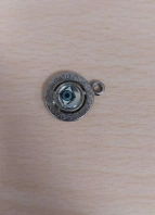 Anhänger in silber mit einem Auge in der Mitte.