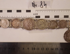 Asservat 84: Ketten bestehend aus mehreren Münzen